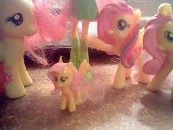 Size: 640x480 | Tagged: safe, derpibooru import, fluttershy, equestria girls, brushable, figure, figurine, irl, multeity, photo, so much flutter, tiny ponies, toy