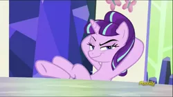 Size: 1136x640 | Tagged: crossed legs, derpibooru import, discovery family logo, evil grin, friendship throne, hooves behind head, hooves on the table, looking at you, raised eyebrow, s5 starlight, safe, screencap, season 5, smiling, smirk, smug, smuglight glimmer, solo, starlight glimmer, the cutie re-mark, underhoof, welcome home twilight