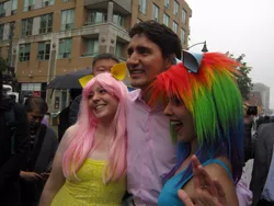 Size: 790x593 | Tagged: safe, derpibooru import, fluttershy, rainbow dash, human, canada, clothes, cosplay, costume, female, flutterdash, irl, irl human, justin trudeau, lesbian, photo, politics, pride parade, shipping