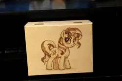 Size: 1280x854 | Tagged: safe, artist:horseez, derpibooru import, sunset shimmer, pony, unicorn, backwards cutie mark, box, pyrography, solo, woodwork