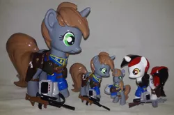 Size: 2293x1509 | Tagged: safe, artist:gryphyn-bloodheart, derpibooru import, oc, oc:blackjack, oc:littlepip, unofficial characters only, pony, unicorn, fallout equestria, fallout equestria: project horizons, fanfic, blind bag, clothes, custom, female, funko, gun, handgun, hooves, horn, irl, little macintosh, mare, mystery mini, optical sight, photo, pipbuck, revolver, saddle bag, toy, vault suit, weapon