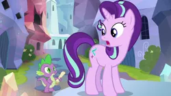 Size: 1280x720 | Tagged: animation error, derpibooru import, looking back, open mouth, raised hoof, safe, screencap, scroll, spike, stare, starlight glimmer, the crystalling