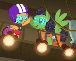 Size: 591x476 | Tagged: safe, derpibooru import, screencap, geronimo, scootaloo, pony, on your marks, bungee jumping, clothes, dreadlocks, dreads, goggles, harness, helmet, hoofbump, jumpsuit, male, pillow, rope, spotlight, stage, stallion
