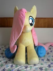 Size: 1488x1984 | Tagged: artist:qtpony, cropped, derpibooru import, fluttershy, irl, life size, photo, plushie, safe, solo