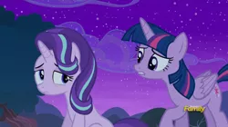 Size: 1008x565 | Tagged: safe, derpibooru import, screencap, starlight glimmer, twilight sparkle, twilight sparkle (alicorn), alicorn, pony, no second prances, discovery family logo, female, mare, sitting