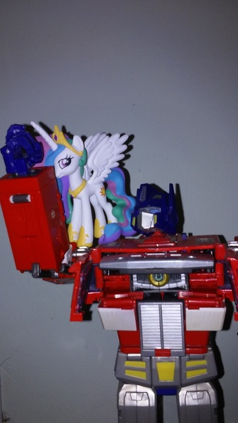 Size: 1440x2560 | Tagged: artist:kartoon12, derpibooru import, funko, irl, matrix of leadership, optimus prime, photo, princess celestia, safe, toy, transformers