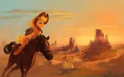 Size: 1920x1200 | Tagged: safe, artist:fruitbloodmilkshake, derpibooru import, applejack, earth pony, horse, pony, bandana, bridle, butte, cloak, clothes, cowboy, cowboy hat, desert, female, hat, horse-pony interaction, looking at you, mare, monument valley, one eye closed, ponies riding horses, reins, scenery, smiling, solo, sunset, tack, wink