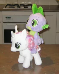 Size: 1189x1505 | Tagged: safe, artist:cheerbearsfan, derpibooru import, spike, sweetie belle, dragon, pony, dragons riding ponies, female, irl, male, photo, plushie, riding, shipping, spikebelle, straight