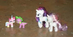 Size: 2605x1326 | Tagged: artist:cheerbearsfan, blind bag, brushable, crossover, crossover shipping, derpibooru import, irl, lego, photo, rarity, safe, shipping, spike, sweetie belle, the lego movie, toy, unikitty