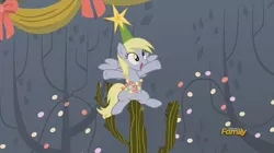 Size: 1477x826 | Tagged: safe, derpibooru import, edit, edited screencap, screencap, derpy hooves, pegasus, pony, a hearth's warming tail, cactus, christmas lights, derpy star, discovery family logo, female, hat, literal butthurt, mare, pain, photoshop, solo, stars