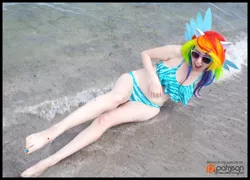 Size: 2000x1438 | Tagged: artist:krazykari, barefoot, beach, bikini, clothes, cosplay, costume, derpibooru import, feet, human, irl, irl human, photo, rainbow dash, safe, solo, swimsuit, wave