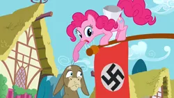 Size: 1280x720 | Tagged: safe, deleted from derpibooru, derpibooru import, edit, edited screencap, screencap, cranky doodle donkey, pinkie pie, donkey, antisemitism, bald, edgy, flag, humiliation, megaphone, nazi, open mouth, ponyville, swastika, talking, this donkey is really really bald, tongue out