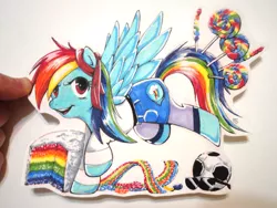 Size: 4320x3240 | Tagged: safe, artist:spirit-woods, derpibooru import, rainbow dash, pegasus, pony, bucking, cake, candy, clothes, cute, denim skirt, female, food, football, leggings, lollipop, mare, marker drawing, shirt, skirt, solo, spread wings, sunglasses, traditional art