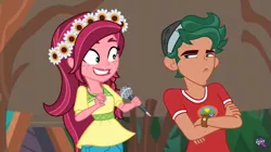 Size: 847x473 | Tagged: safe, derpibooru import, screencap, gloriosa daisy, timber spruce, equestria girls, legend of everfree, brother and sister, camp everfree logo, camp everfree outfits, excited, female, flower, frown, headband, magical geodes, male, microphone, smiling, timber spruce is not amused, unamused, watermark