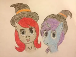 Size: 960x720 | Tagged: safe, anonymous artist, derpibooru import, oc, oc:ponepony, oc:seafood dinner, unofficial characters only, earth pony, pony, unicorn, chest fluff, colored pencil drawing, cute, halloween, hat, looking at you, tongue out, traditional art, witch hat