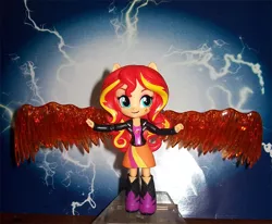 Size: 1032x850 | Tagged: safe, derpibooru import, sunset shimmer, equestria girls, boots, clothes, doll, equestria girls minis, fiery wings, irl, jacket, leather jacket, photo, skirt, solo, sunset phoenix, toy