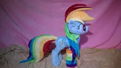 Size: 1024x576 | Tagged: artist:zombies8mywaffle, clothes, derpibooru import, irl, photo, plushie, rainbow dash, rainbow socks, safe, socks, solo, striped socks