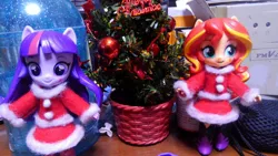 Size: 2048x1152 | Tagged: safe, derpibooru import, sunset shimmer, twilight sparkle, equestria girls, christmas, christmas tree, clothes, costume, doll, equestria girls minis, eqventures of the minis, irl, photo, santa costume, toy, tree