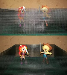 Size: 850x948 | Tagged: semi-grimdark, derpibooru import, applejack, sunset shimmer, equestria girls, arena, cage, clothes, doll, equestria girls minis, eqventures of the minis, fight, skirt, sword, toy, weapon