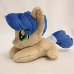 Size: 960x960 | Tagged: safe, artist:burgunzik, derpibooru import, oc, oc:bloody sword, unofficial characters only, earth pony, pony, irl, male, photo, plushie, prone, solo, stallion