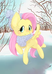 Size: 1024x1448 | Tagged: safe, artist:squishycuddle, derpibooru import, fluttershy, clothes, cute, flying, hat, head turn, ice, looking at you, scarf, shyabetes, snow, solo, spread wings, winter