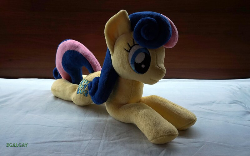 Size: 2048x1281 | Tagged: safe, artist:egalgay, derpibooru import, bon bon, sweetie drops, earth pony, pony, irl, photo, plushie, prone, solo