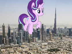 Size: 1558x1179 | Tagged: safe, artist:logan859, artist:twls7551, derpibooru import, starlight glimmer, pony, burj khalifa, dubai, giant pony, giant starlight glimmer, highrise ponies, irl, macro, photo, ponies in real life