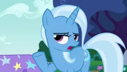 Size: 1280x720 | Tagged: safe, derpibooru import, screencap, trixie, pony, unicorn, no second prances, season 6, female, horn, image, lidded eyes, mare, open mouth, outdoors, png, raised hoof, solo, tail