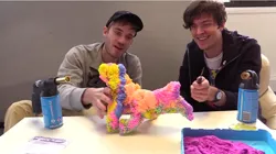 Size: 852x477 | Tagged: safe, artist:kickthepj, artist:pewdiepie, derpibooru import, human, pony, 1000 degree knife, barely pony related, blowtorch, craft, foam, irl, irl human, kickthepj, kinetic sand, knife, meme, pewdiepie, photo, playfoam, sand, sculpture, smiling, toy, toy abuse, traditional art, youtube, youtube link