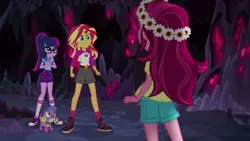 Size: 1280x720 | Tagged: safe, derpibooru import, screencap, gloriosa daisy, sci-twi, spike, spike the regular dog, sunset shimmer, twilight sparkle, dog, equestria girls, legend of everfree, cave, clothes, converse, glasses, rear view, shoes, shorts, sneakers