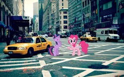 Size: 1024x640 | Tagged: artist:dashiesparkle, artist:jerryakira79, car, crown victoria, derpibooru import, eyes closed, irl, new york city, photo, pinkie pie, ponies in real life, rearing, safe, taxi, twilight sparkle, van