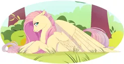 Size: 4400x2270 | Tagged: safe, artist:glastalinka, derpibooru import, fluttershy, absurd resolution, floppy ears, forest, looking at you, looking sideways, profile, prone, solo, spread wings, unshorn fetlocks