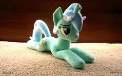 Size: 800x501 | Tagged: safe, artist:egalgay, derpibooru import, lyra heartstrings, pony, unicorn, handmade, irl, lidded eyes, photo, plushie, solo