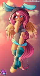 Size: 861x1634 | Tagged: safe, artist:sugarlesspaints, derpibooru import, fluttershy, pegasus, pony, blushing, bunny ears, clothes, colored pupils, colored wings, colored wingtips, costume, cute, dangerous mission outfit, female, flying, hoodie, mare, shyabetes, smiling, socks, solo, striped socks, sunset