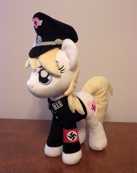 Size: 1934x2432 | Tagged: safe, artist:anonymous, derpibooru import, oc, oc:aryanne, unofficial characters only, earth pony, pony, clothes, female, hat, heart, irl, nazi, photo, plushie, schutzstaffel, solo, standing, swastika, totenkopf, uniform