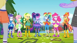 Size: 924x523 | Tagged: safe, derpibooru import, screencap, applejack, derpy hooves, fluttershy, microchips, pinkie pie, rainbow dash, rarity, sunset shimmer, twilight sparkle, equestria girls, legend of everfree, balloon, boots, camp everfree outfits, clothes, crystal guardian, crystal wings, glasses, high heel boots, humane five, humane seven, humane six, jewelry, looking at you, mane six, ponytail, shoes, smiling, sneakers, socks, sparkles, sun, wings
