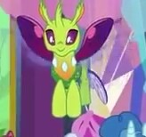 Size: 164x154 | Tagged: safe, derpibooru import, screencap, party favor, changedling, changeling, pony, celestial advice, background changeling, cute, cuteling, flying, horn, offscreen character, picture for breezies, smiling, solo focus, twilight's castle, wings