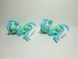 Size: 4608x3456 | Tagged: safe, artist:earthenpony, derpibooru import, lyra heartstrings, pony, absurd resolution, craft, photo, prone, sculpture, self ponidox, sleeping, traditional art