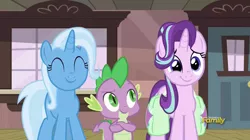 Size: 912x510 | Tagged: safe, derpibooru import, screencap, spike, starlight glimmer, trixie, dragon, pony, unicorn, all bottled up, cute, diatrixes, discovery family logo, female, glimmerbetes, happy, mare, saddle bag, smiling, the amazing trio of friendship
