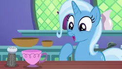 Size: 1280x720 | Tagged: safe, derpibooru import, screencap, trixie, pony, unicorn, all bottled up, cup, cute, diatrixes, female, kitchen, mare, open mouth, pepper shaker, raised hoof, solo, teacup, that pony sure does love teacups