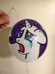 Size: 1024x1365 | Tagged: abuse, artist:kckreations, balloon, balloon popping, crying, derpibooru import, hand, irl, needle, paint on balloon, photo, rarity, semi-grimdark, watermark