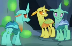 Size: 1050x672 | Tagged: safe, derpibooru import, screencap, clypeus, cornicle, changedling, changeling, pony, celestial advice, background changeling, changeling hive, cute, floppy ears, sad, trio