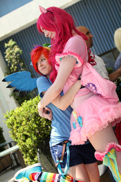 Size: 1280x1920 | Tagged: artist needed, safe, artist:brianfloresphoto, artist:moorisa42, derpibooru import, pinkie pie, rainbow dash, human, 2012, anime expo, clothes, convention, cosplay, costume, female, hug, irl, irl human, lesbian, photo, pinkiedash, shipping