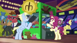 Size: 1920x1080 | Tagged: safe, derpibooru import, screencap, colton john, levon song, lightning riff, lock heart, penn jillette, rosy pearl, teller, earth pony, pegasus, pony, unicorn, viva las pegasus, background pony, clothes, crane game, female, glasses, las pegasus resident, male, mare, necktie, penn and teller, shirt, skeeball, stallion, suit