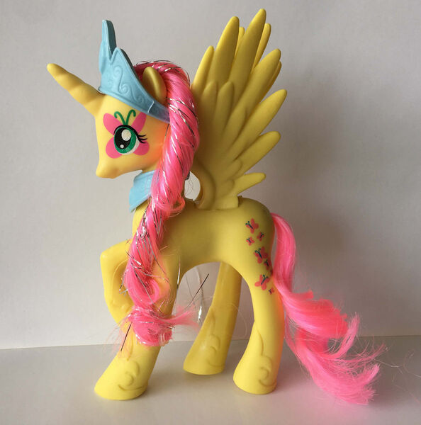 Size: 1583x1599 | Tagged: safe, derpibooru import, fluttershy, alicorn, pony, bootleg, brushable, fluttercorn, irl, photo, race swap, solo, toy