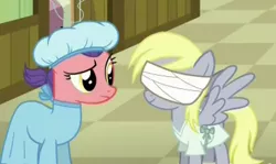 Size: 452x269 | Tagged: safe, derpibooru import, screencap, derpy hooves, earth pony, pegasus, pony, where the apple lies, bandage, female, frown, hospital gown, mare, raised eyebrow, smiling, spread wings, teenage derpy hooves, wings, worried, younger