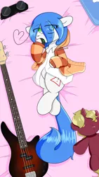 Size: 1800x3200 | Tagged: artist:fullmetalpikmin, bass guitar, bed, clothes, derpibooru import, goggles, hoodie, musical instrument, oc, oc:mal, on back, plushie, shirt, suggestive, unofficial characters only