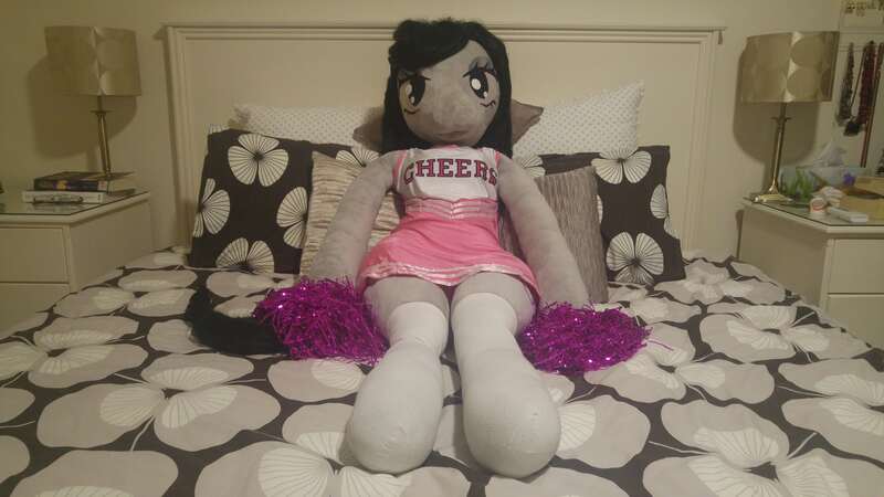 Size: 5312x2988 | Tagged: absurd resolution, anthro, anthro plushie, artist:bigsexyplush, artist:somethingaboutoctavia, bed, bedroom eyes, cheerleader, cheerleader outfit, clothes, costume, cute, derpibooru import, doll, hooves, irl, octavia melody, outfit, photo, plushie, pom pom, safe, socks, socktavia, solo, thigh highs, thunder thighs, toy, unguligrade anthro, wide hips