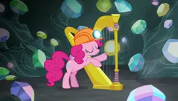 Size: 1920x1090 | Tagged: safe, derpibooru import, screencap, pinkie pie, pony, rock solid friendship, cave, gem, gem cave, harp, helmet, mining helmet, musical instrument, solo