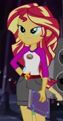 Size: 235x449 | Tagged: safe, derpibooru import, screencap, flash sentry, sunset shimmer, equestria girls, legend of everfree, book, camp everfree outfits, cropped, crystal gala, legend you were meant to be, lidded eyes, lights, smiling, solo, sun
